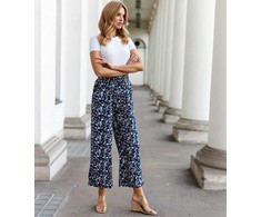 Grazia gėlių rašto juodos spalvos platėjančios kelnės