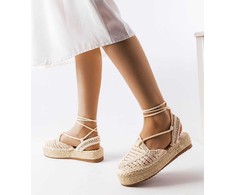 smėlio spalvos suvarstomos espadrilės