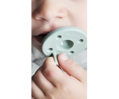 Dinaminis silikoninis čiulptukas MinikOiOi 2 vnt. Žalias kūdikiams 0-24m