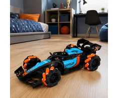 Lean Toys Nuotoliniu būdu valdomas sportinis automobilis su šviesos efektais, juodas su mėlynais ir oranžiniais elementais, 31 x 13,5 x 7,5 cm