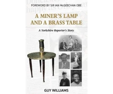 KNYGA Bookshop Miners Lamp and a Brass Table