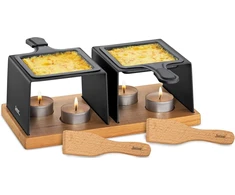 Sumuštinių keptuvas Spring Gourmet Party, raclette su žvakėmis 2 asmenims, sūrio raclette grilis, buko medžio pagrindas, 2 padengtos raclette keptuvės, 2 mediniai raclette grandikliai, 4 žvakės, raclette grilis