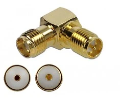 Delock Adapteris SMA Buchse zu RP-SMA Buchse 90° 10 GHz