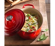 Le Creuset skrudintuvas Signature ovalus 27 cm orkaitėje raudonas