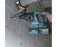 Makita DHR242ZJW*Available in April Akumuliatorinis perforatorius, 18 V, SDS-PLUS, 2,0J LED, VACUUM, Be akumuliatorių ir kroviklio!