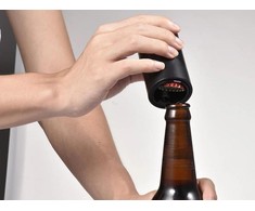 Automatic beer bottle cap opener
