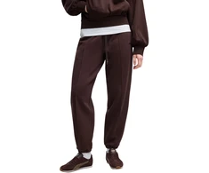 Kelnės moterims Puma Her Comfort Pants Fl ciemnobrązowe 694032 33 (L)