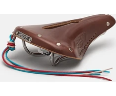 Brooks BROOKS B17 CARVED SHORT balnelis, rudas, plieniniai lankeliai, svoris 460 g, linija „Leather"