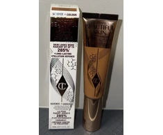 Charlotte Tilbury „Beautiful Skin Science + Colour Radiant Finish“ skystas makiažo pagrindas, 13 Warm Chaud, 30 ml