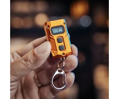 Nitecore TINI3 Žibintuvėlis-raktų pakabukas, 600 lm, 90 m, OLED ekranas, 330 mAh, USB-C, IP54, oranžinės spalvos