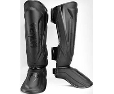 Venum Elite Evo blauzdų apsaugos, juodos/juodos