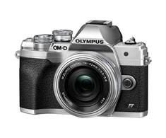 Olympus Apie sistemą Olympus OM-D E-M10 Mark IV (Sidabrinis) + 14-42mm f/3.5-5.6 EZ