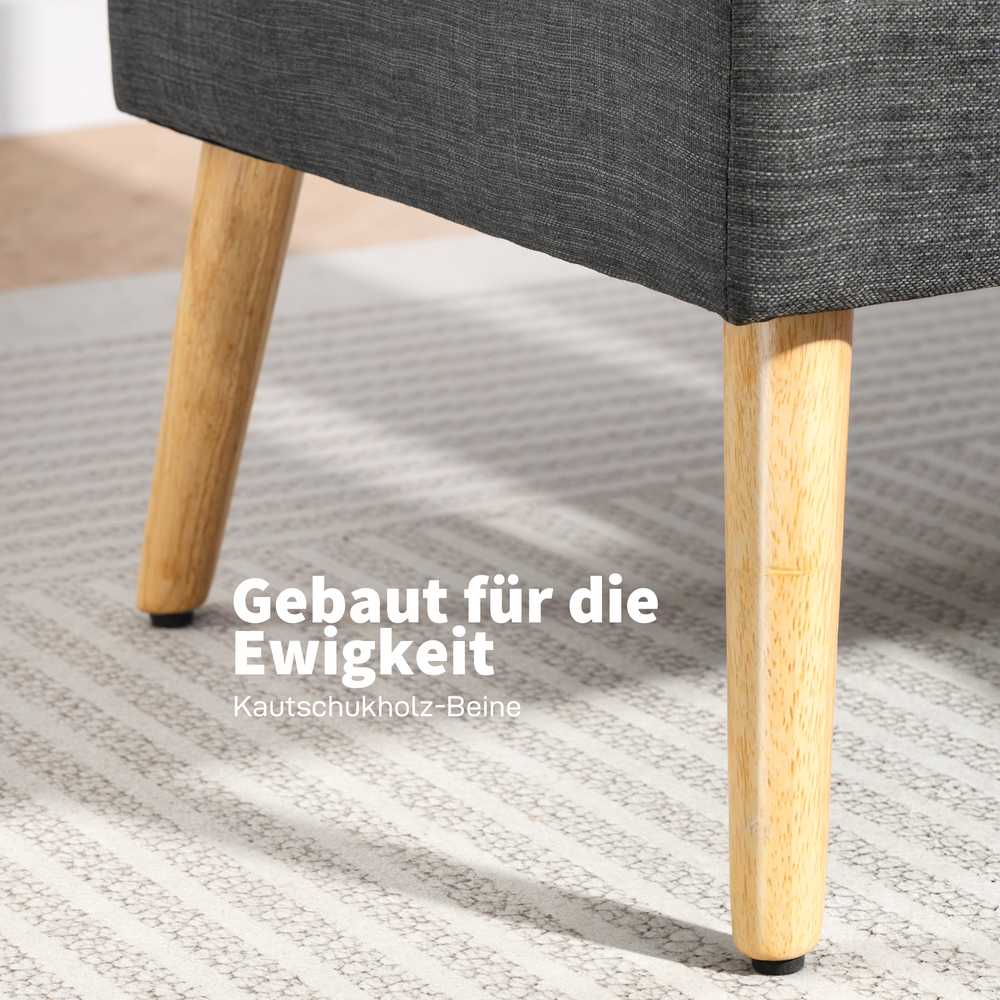 Dvivietė sofa, dygsniuotas atlošas, medinės kojelės, stambus polsteris, lininio audinio imitacija, tamsiai pilka