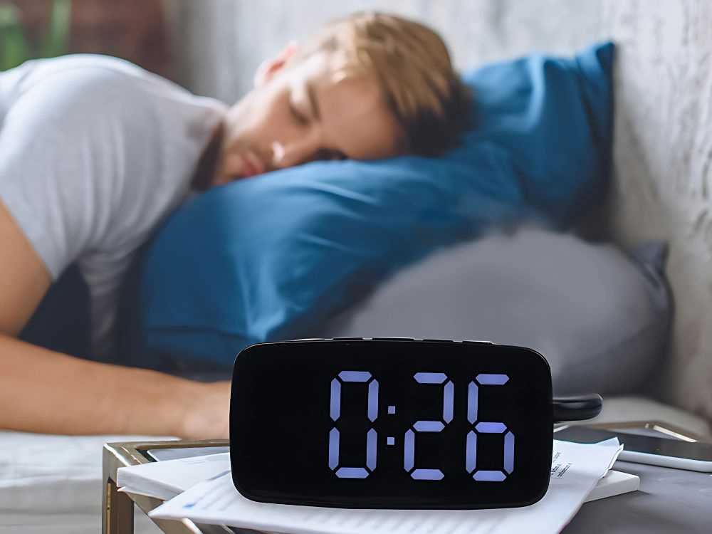 Elektroninis žadintuvas su vibraciniu padu