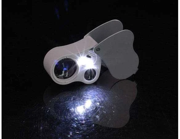 Kišeninė juvelyrinė lupa su LED apšvietimu ir UV funkcija 25x-50x