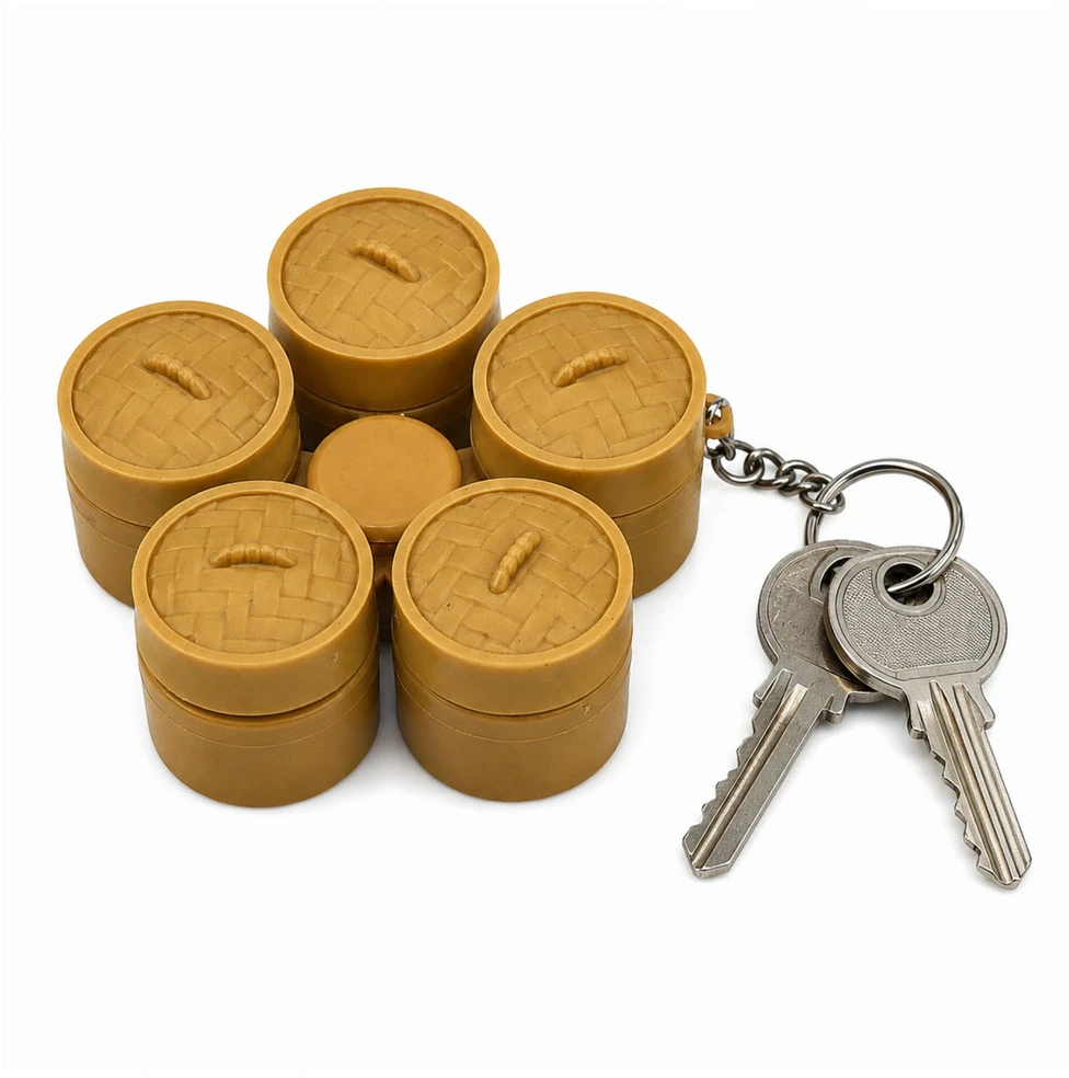 Lean Toys Suktukas-raktų pakabukas su 5 šviečiančiais koldūnais, daugiaspalvis, 9,5 × 9,5 × 3,5 cm