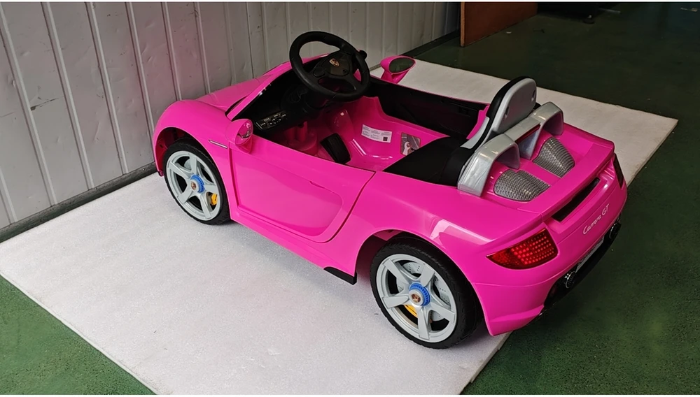 Vaikiškas elektromobilis Porsche Carrera GT su nuotoliniu valdymu, rožinis/juodas, 111,1 × 59 × 45 cm