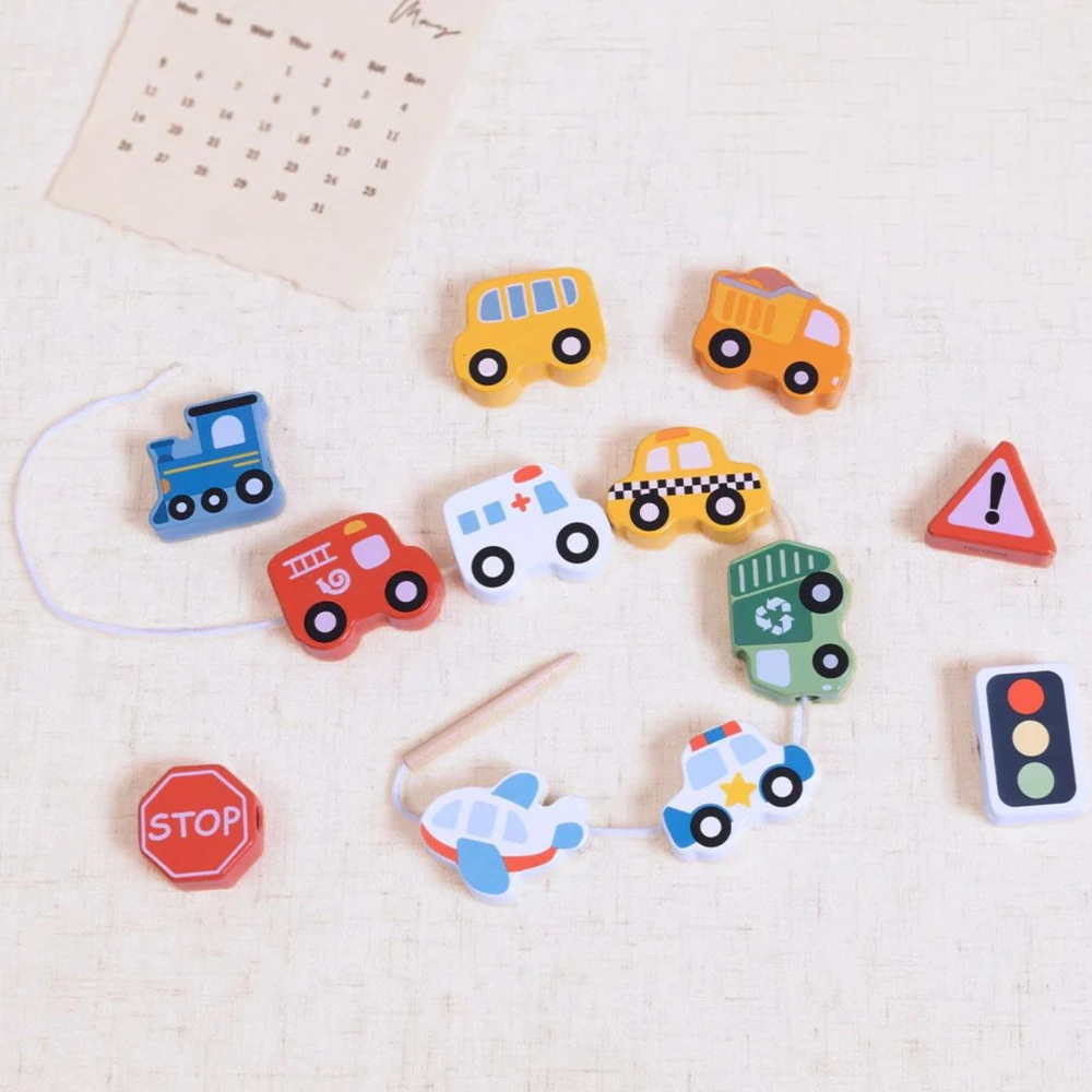 Woopie Žalias medinis vėrimo žaislas Transportas 13 vnt