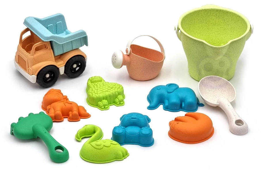 WOOPIE Smėlio rinkinys su kibiru ir automobiliu, 11 vnt., biodegraduojantis organinis medžiaga