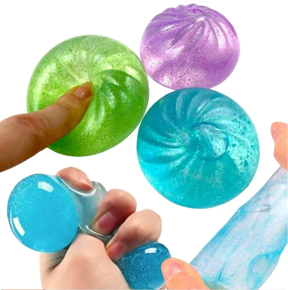 Antistresinis minkštukas „Dumpling Squishy“ su blizgučiais