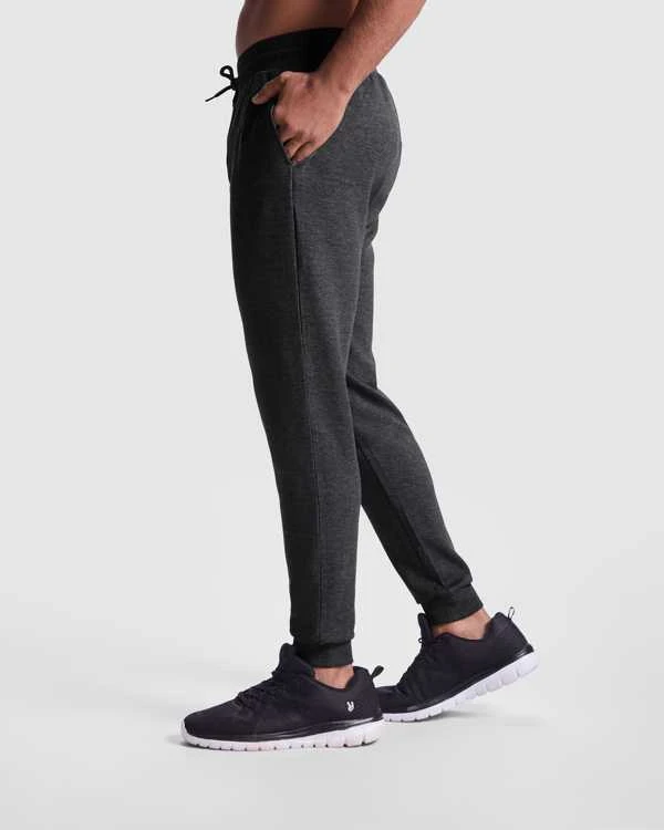 Roly Unisex ilgos kelnės su rankogaliais ant klešnių IRIA Heather juodas