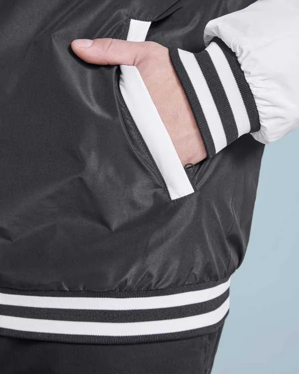 Roly Unisex lengvai paminkštinta dviejų spalvų striukė CALIFORNIA Butelis žalias