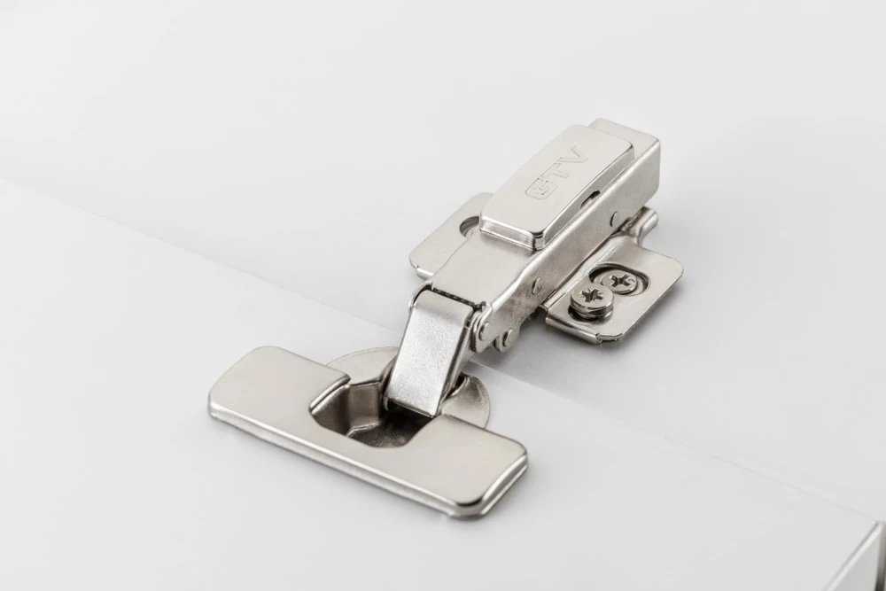 Hydraulic hinge half-recessed, with eccentric adjustment on the arm and on the slide, H=0,