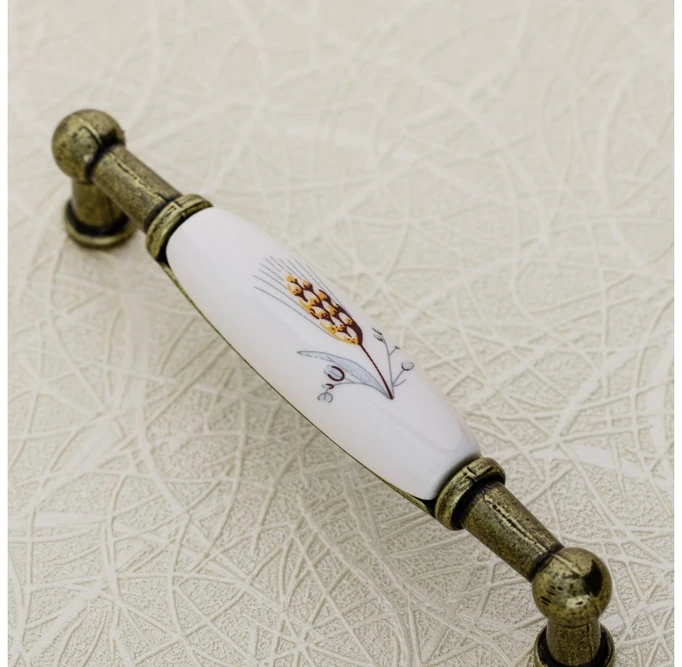 Porcelain handle 728B C=96mm antique brass K-wheet