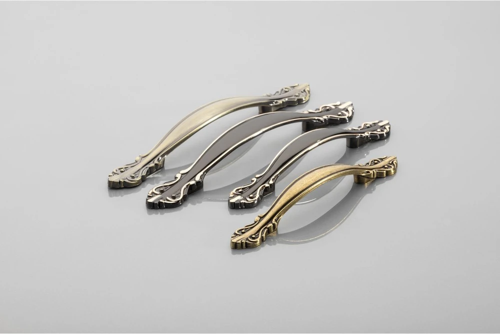 Zamak handle WERONA C=128 mm juodas chrome plus auksinis