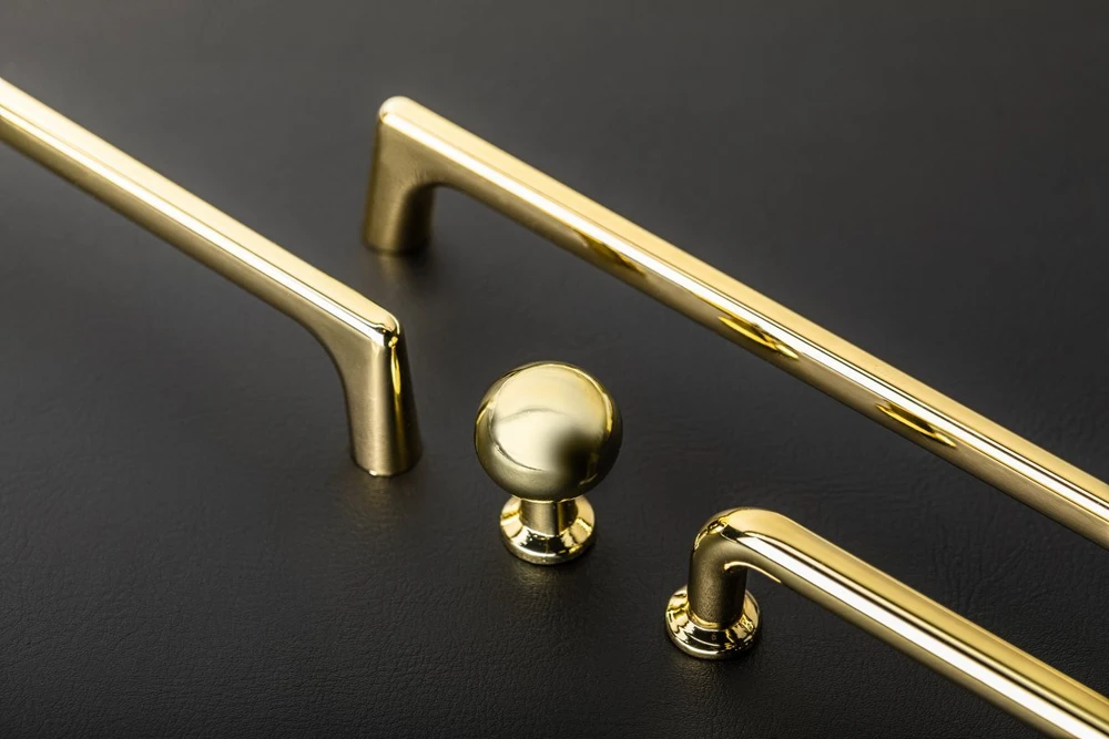 Zamak knob NORD shiny auksinis