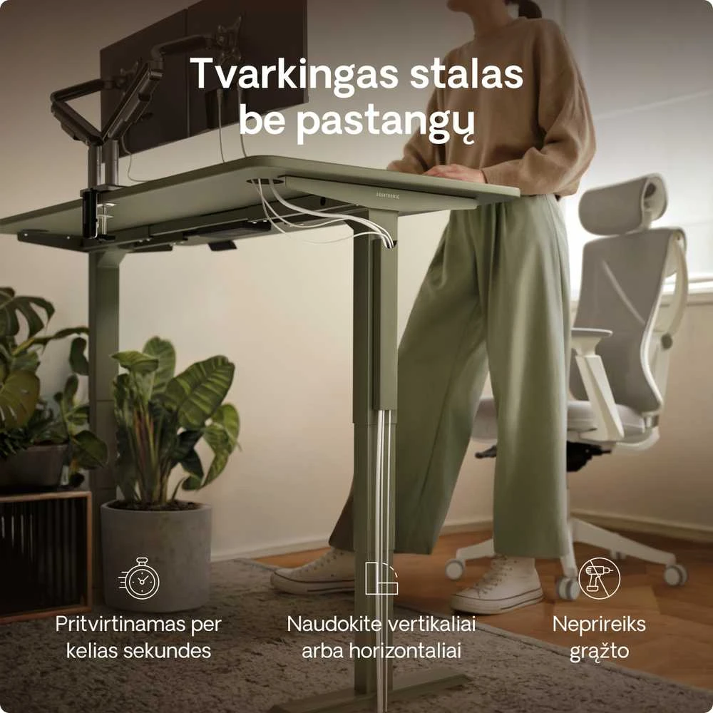 Žalias magnetinis laidų laikiklis ant stalo kojos