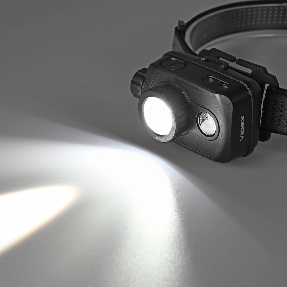 LED galvos žibintas su jutikliu įkraunamas 10W 1000Lm 5000K 2000mAh IP65 VIDEX VLF-H047Z | Raudona šviesa – Reguliuojamas šoninis jungiklis ir tikslus spindulio fokusavimas