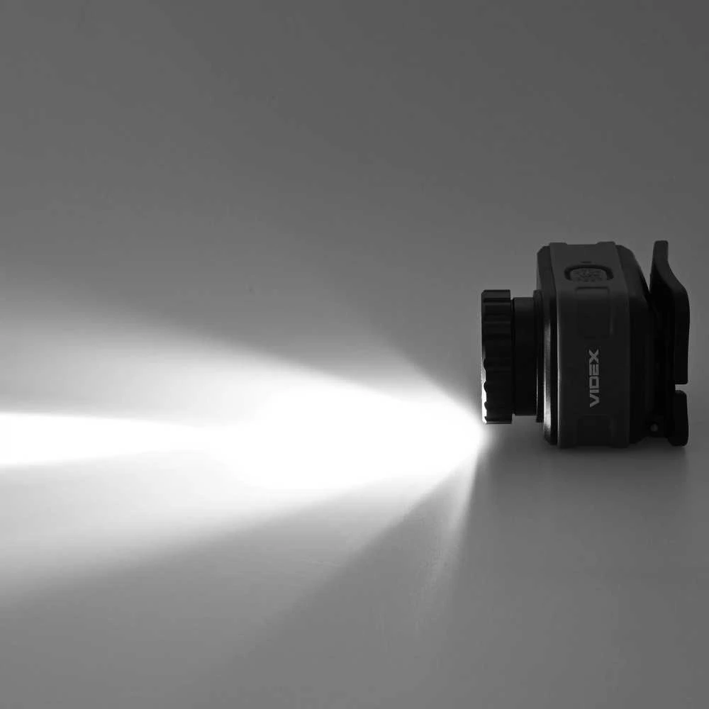 Įkraunamas galvos žibintas su judesio jutikliu LED Luminus SST20 10W, 500Lm 5000K + SMD 3W Raudonas/Žalias, Li-pol 2000mAh, VIDEX VLF-H046Z – Optinis ZOOM fokusavimui ir medžioklės šviesos spektras