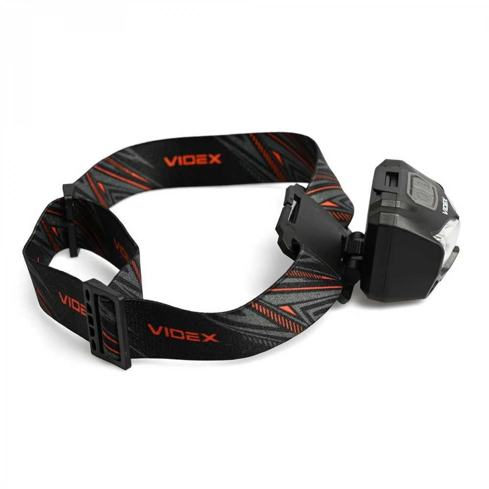 Videx Įkraunamas galvos žibintas su judesio jutikliu LED 2xCREE XTE 5W 500Lm 5000K, Li-ion VLF-B12 1200mAh kai 3xAAA, VLF-H055D – Hibridinis maitinimas iš keičiamo akumuliatoriaus arba AAA baterijų