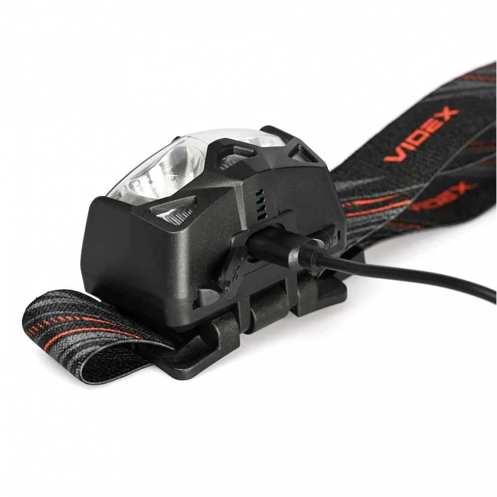Videx Įkraunamas galvos žibintas su judesio jutikliu LED 2xCREE XTE 5W 500Lm 5000K, Li-ion VLF-B12 1200mAh kai 3xAAA, VLF-H055D – Hibridinis maitinimas iš keičiamo akumuliatoriaus arba AAA baterijų