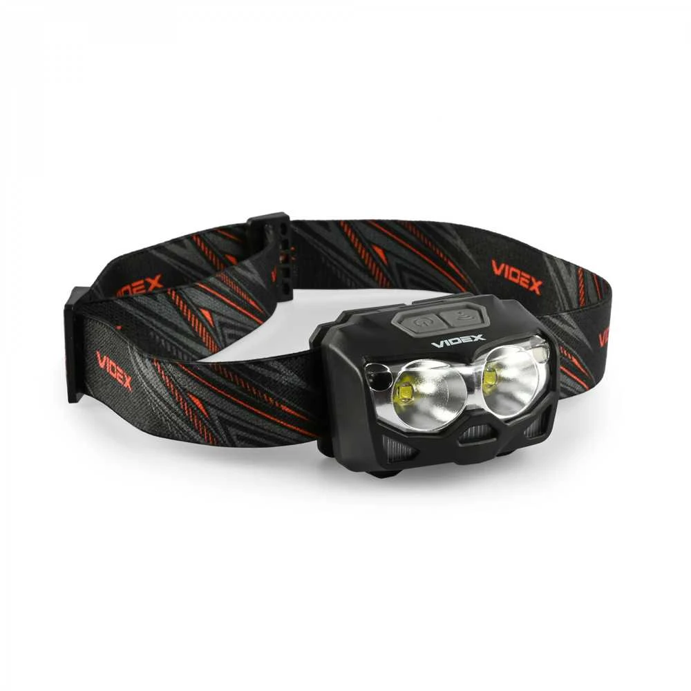 Videx Įkraunamas galvos žibintas su judesio jutikliu LED 2xCREE XTE 5W 500Lm 5000K, Li-ion VLF-B12 1200mAh kai 3xAAA, VLF-H055D – Hibridinis maitinimas iš keičiamo akumuliatoriaus arba AAA baterijų