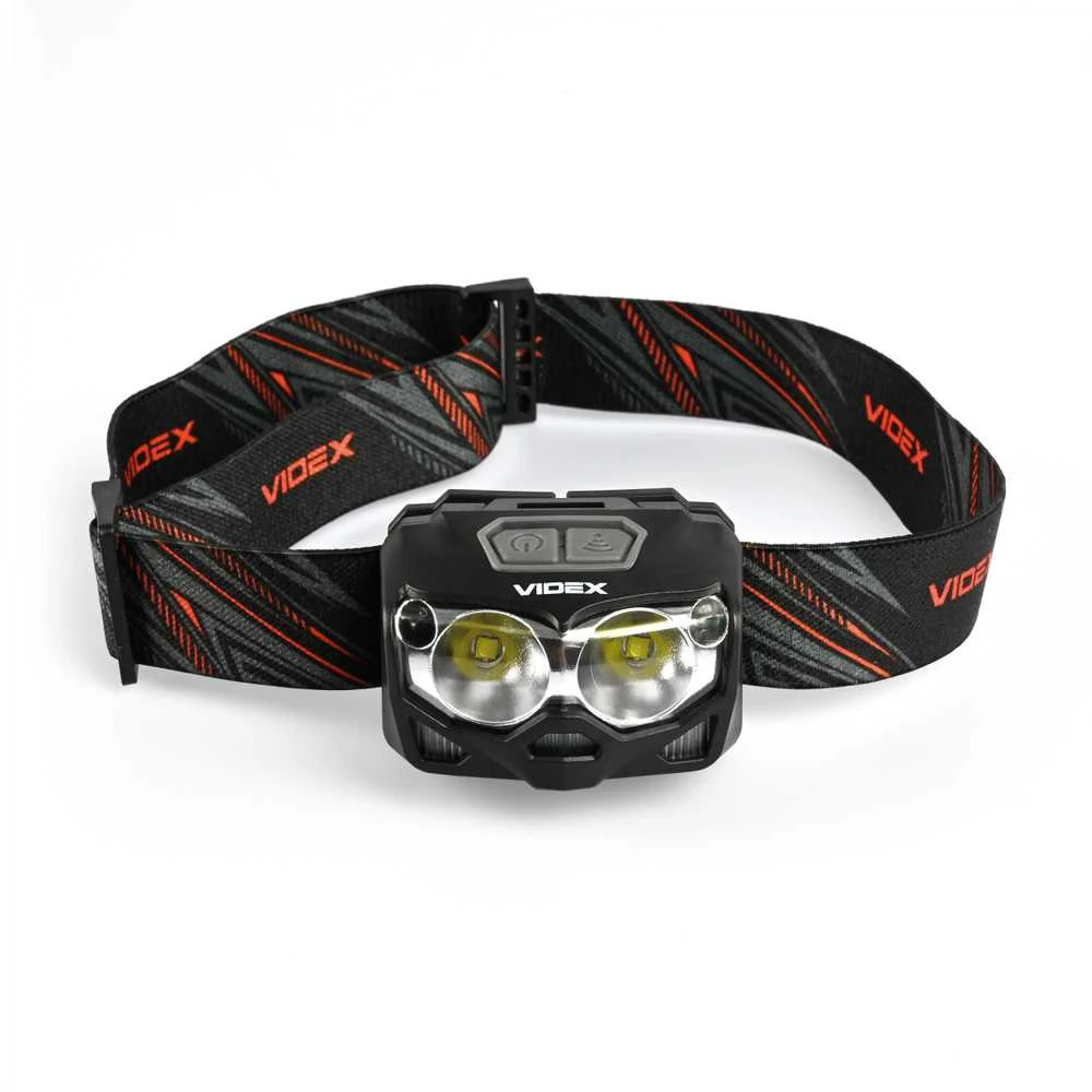 Videx Įkraunamas galvos žibintas su judesio jutikliu LED 2xCREE XTE 5W 500Lm 5000K, Li-ion VLF-B12 1200mAh kai 3xAAA, VLF-H055D – Hibridinis maitinimas iš keičiamo akumuliatoriaus arba AAA baterijų