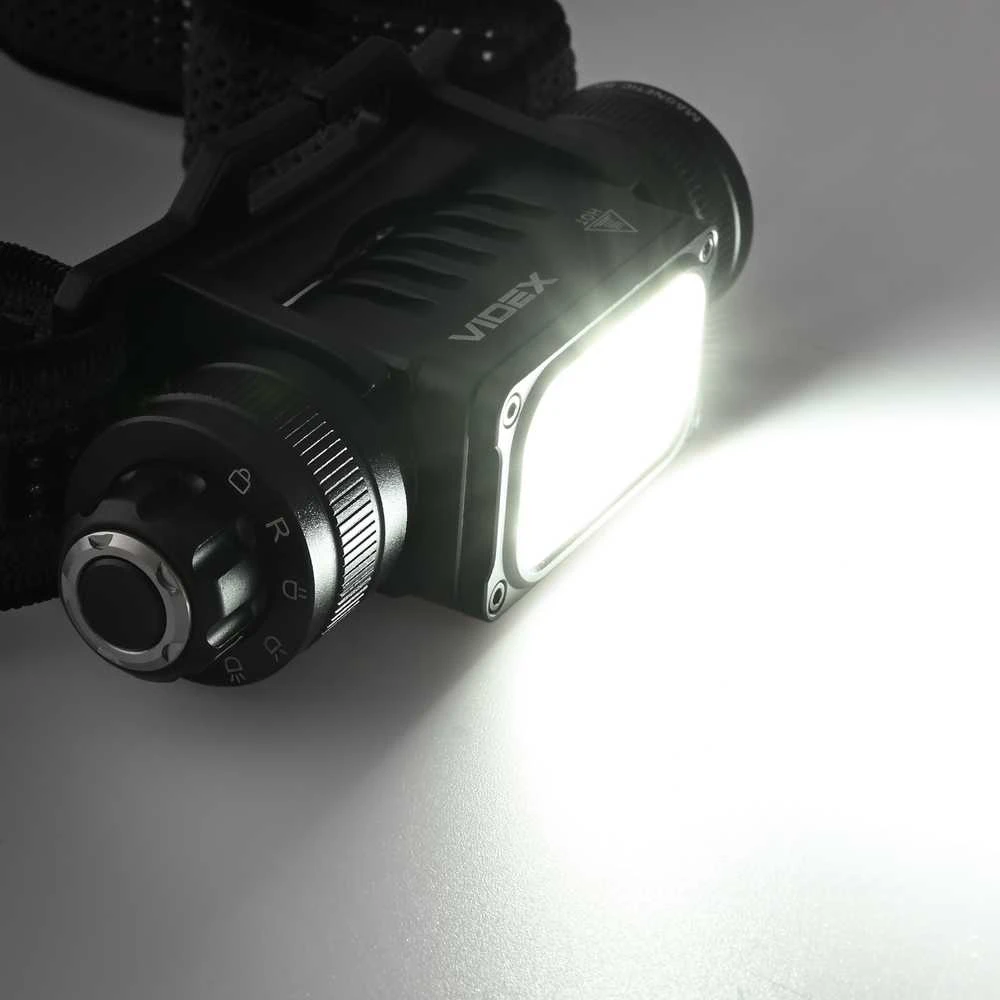 Videx Įkraunamas galvos žibintas LED Luminus SST20 10W / SST40 20W + 2x SMD Raudonas, 2000Lm, 5000K, Li-ion 1х18650 2200mAh, VLF-H066A – Ekstremalaus 2000Lm hibridinio galingumo su dviem Luminus diodais