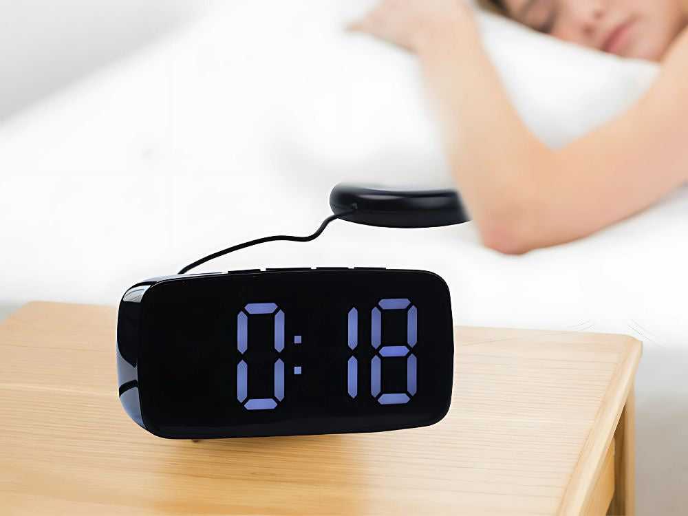 Elektroninis žadintuvas su vibraciniu padu