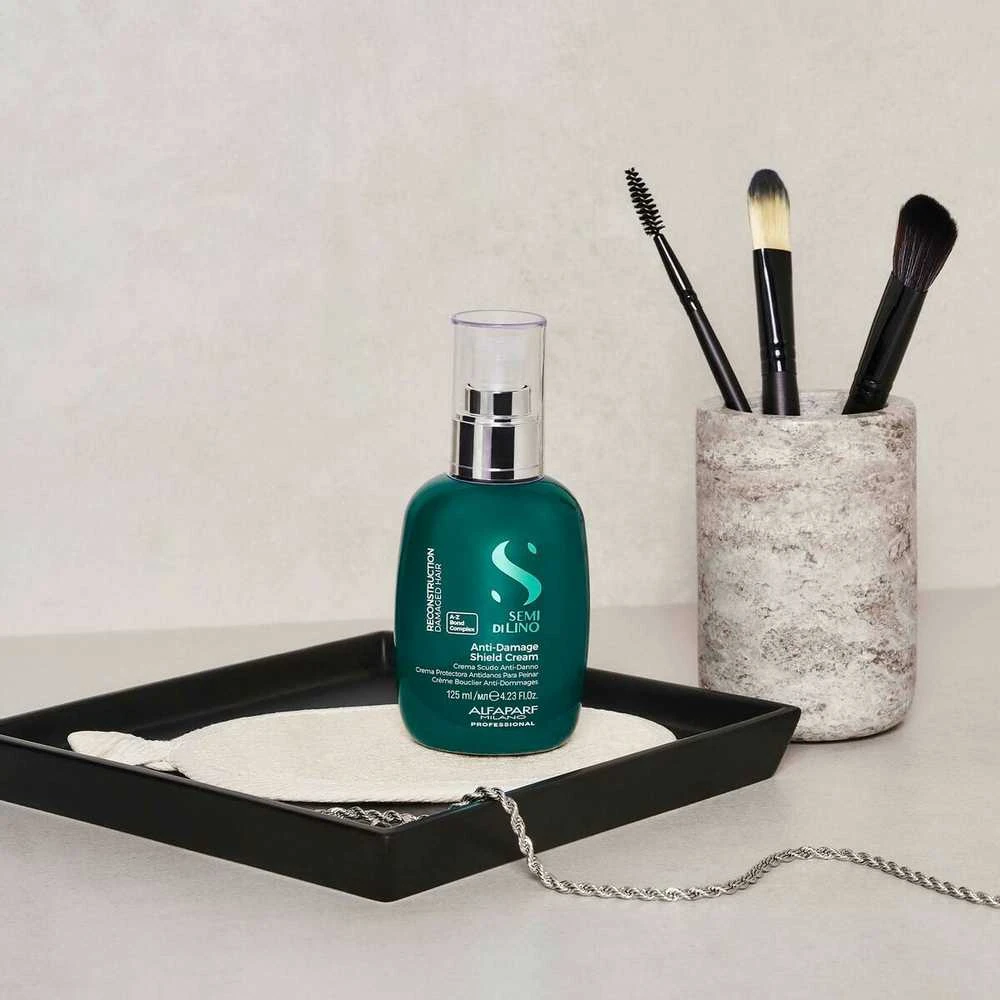 Alfaparf Milano Semi Di Lino Reconstruction Anti-Damage Shield Kreminis atkuriantis kremas pažeistiems plaukams su termine apsauga, 125 ml