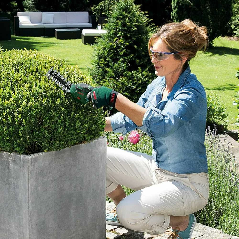 Krūmų ir žolės akumuliatorinių žirklių rinkinys Bosch Isio