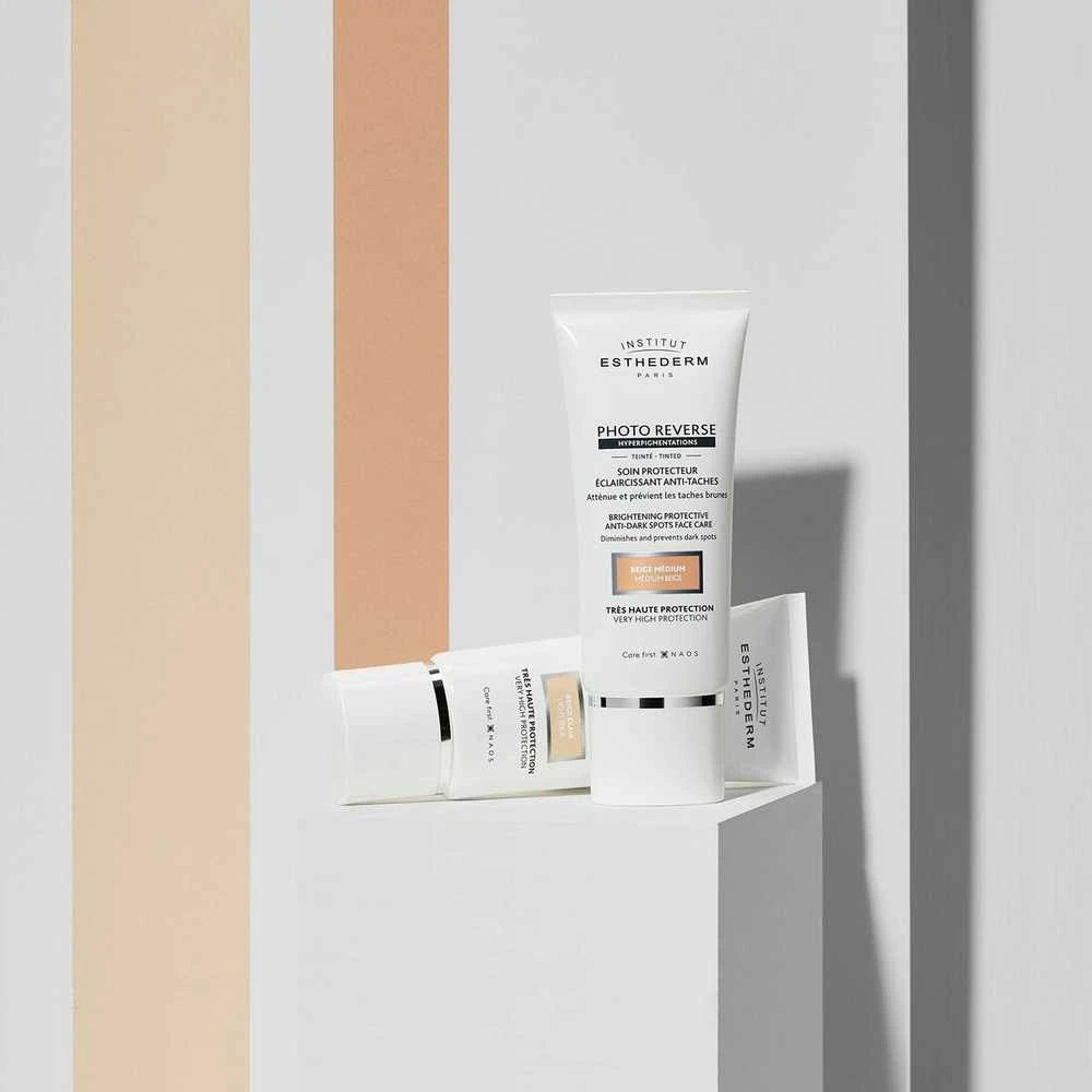 Institut Esthederm Institut Estherderm Photo Reverse rusvai gelsvas Medium apsauginis kremas nuo tamsių dėmių didelė apsauga nuo saulės 50ml