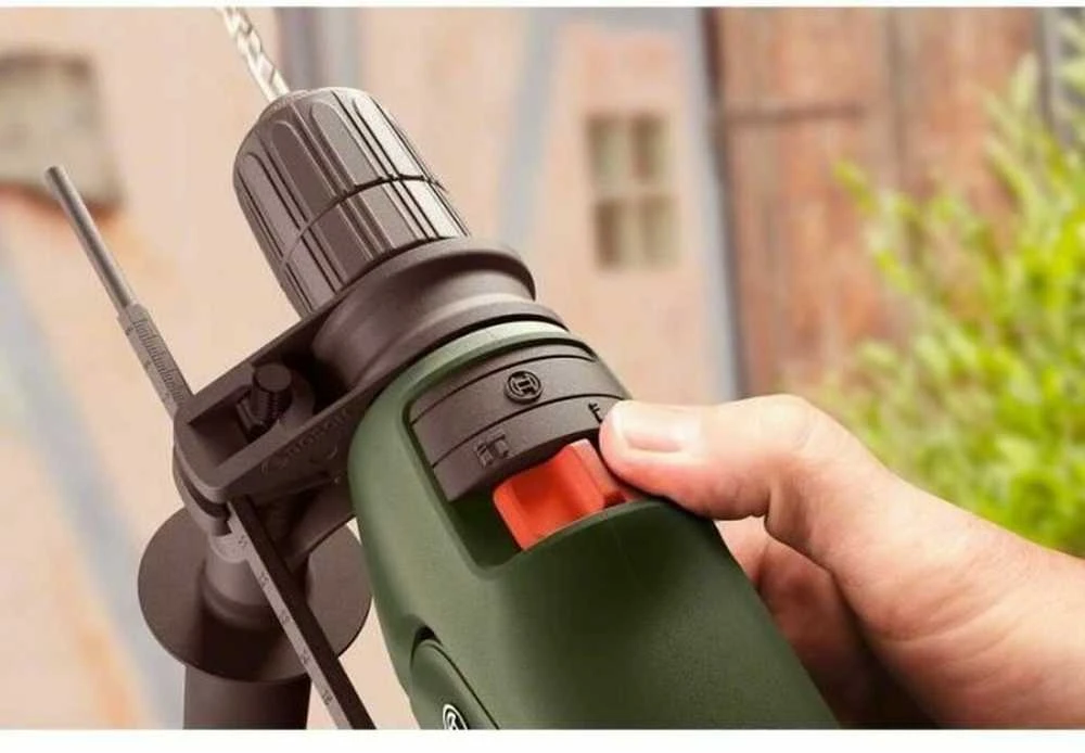 Bosch smūginis grąžtas - Easyimppact 600 (tiekiamas dėžutėje su 1 papildoma rankena ir 1 gylio atrama)