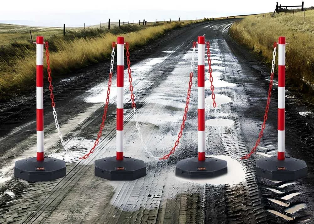 Eismo nukreipimo stulpeliai, reguliuojamas apsauginis barjeras, su užpildomu pagrindu, raudoni ir balti eismo kūgiai, saugos įspėjamieji stulpeliai