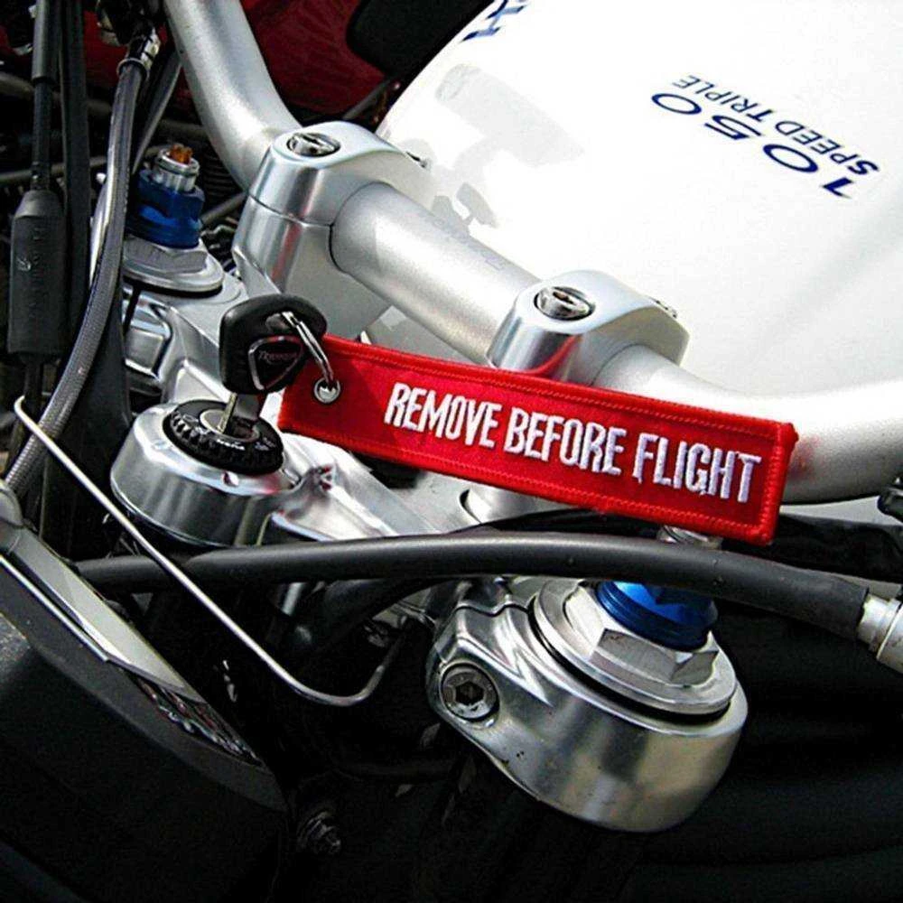 Maxtuned Raktų pakabukas "REMOVE BEFORE FLIGHT"