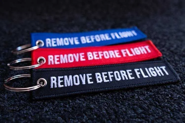 Maxtuned Raktų pakabukas "REMOVE BEFORE FLIGHT"