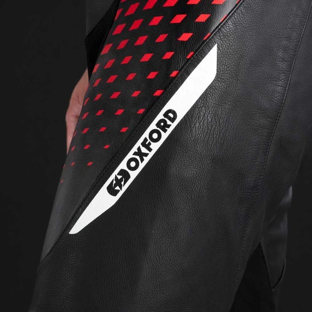 Oxford Nexus 1.0 vienos dalies sportinis kombinezonas juoda / raudona