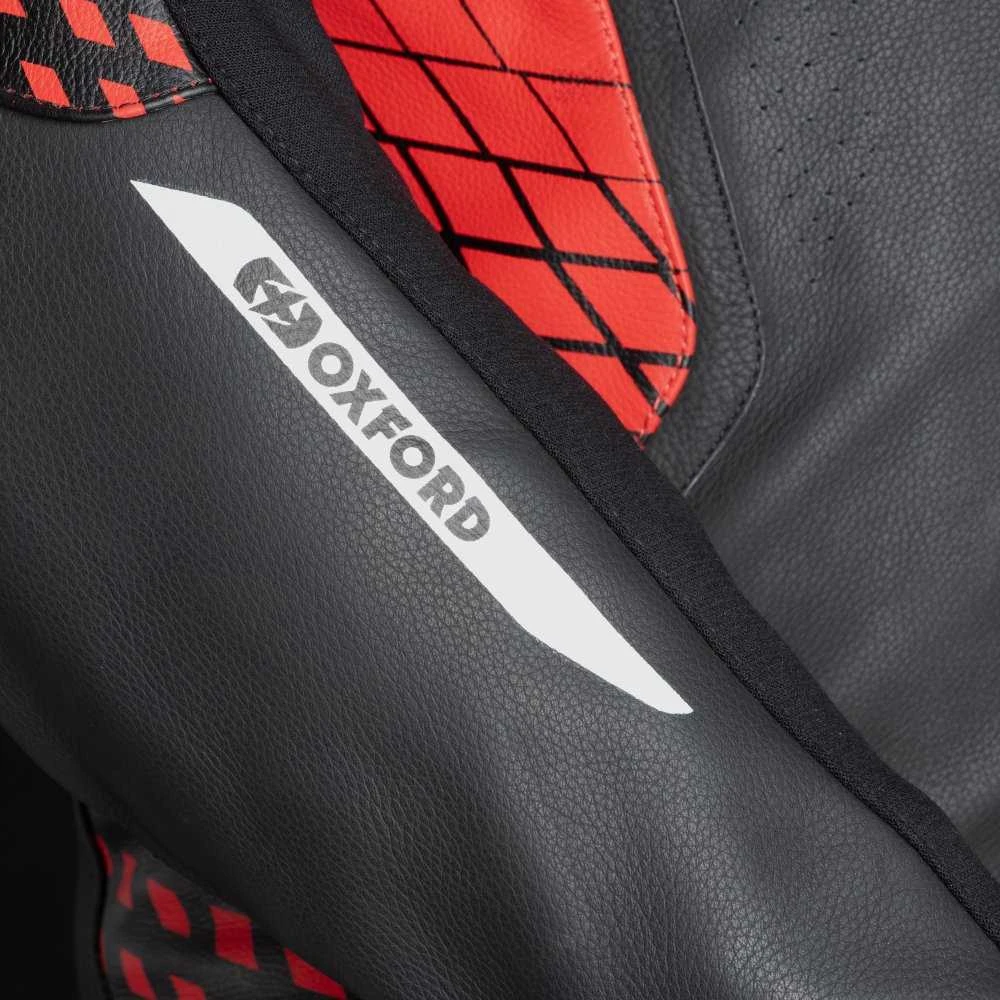 Oxford Nexus 1.0 vienos dalies sportinis kombinezonas juoda / raudona