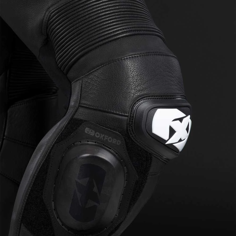 Oxford Nexus 1.0 vienos dalies sportinis kombinezonas juoda / raudona