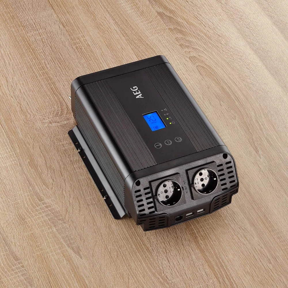 AEG grynosios sinusoidės įtampos keitiklis automobiliui 600 W, 12 V į 230 V, su USB, 10059